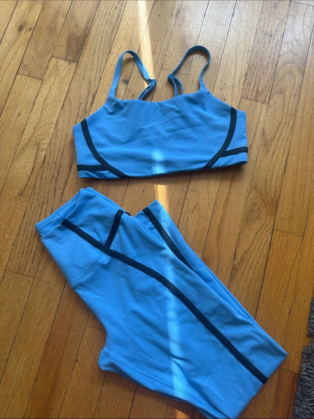 Nike Light Blue Sports Bra and Leggings Set with Dark Trim